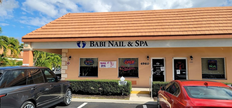Neat manicure stations with polish bottles nearby.